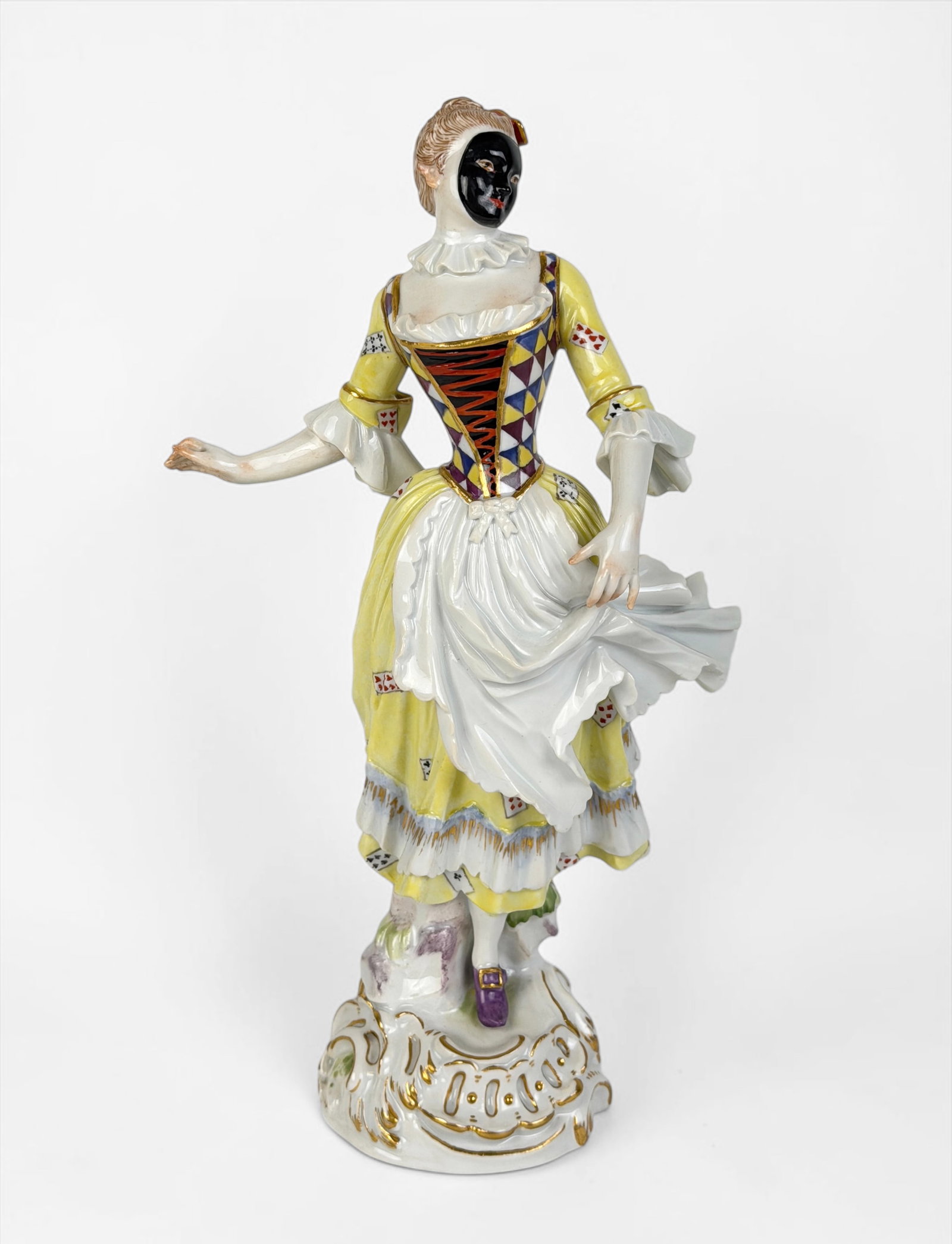 Meissen "Columbina" Porcelain Figure: Marked on the bottom of the figure. Dimensions: 9" x 5" x 3 1/2" Condition: Scuffs to the base. Overall, the figure is in very good condition. Abo