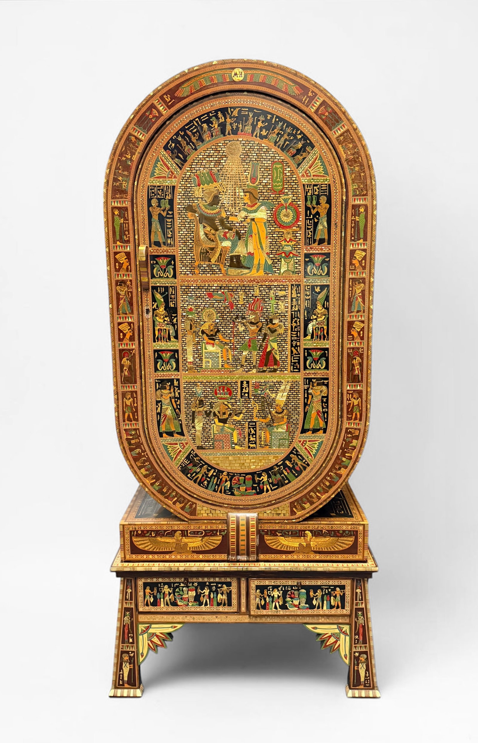 Large Egyptian Themed Inlaid & Painted Cabinet: The base and cabinet are separated. Dimensions: 69 1/2" x 30" x 17" Condition: Some inlaid elements are missing. The door is slightly misaligned. Please see im