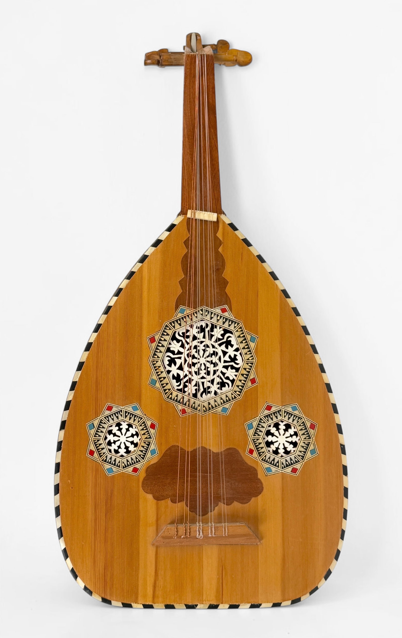 Egyptian Oud W/ Fretless Neck: Dimensions: 30" Long Condition: The strings and bridge need to be replaced. Evidence of repair between the head and the neck of the lute. Scratches and marks throughout the wood. Wea