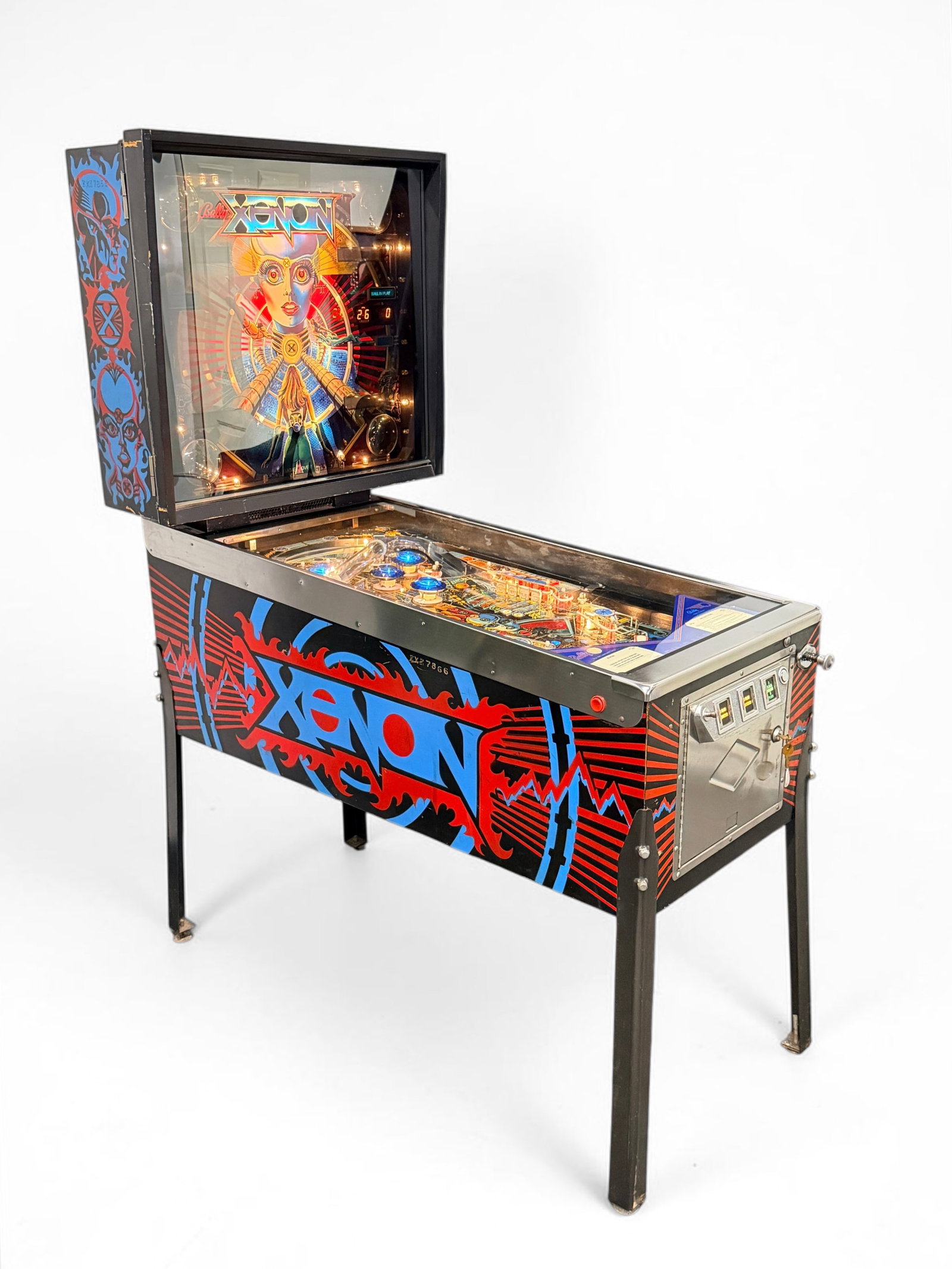 1980 "Xenon" Bally Pinball Machine: Manufactured in 1980 and it was one of the first to feature a human woman's voice. Dimensions: 70 1/4" x 30 1/2" x 52" Condition: The machine lights