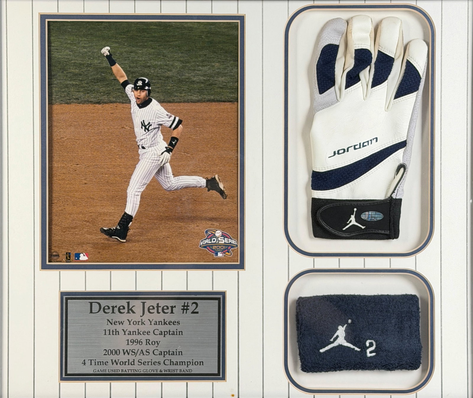 Derek Jeter New York Yankees Batting Glove & Wristband W/ Photograph: Certificate of Authenticity Included Frame: 18" x 21" Condition: The glove and band are in good condition. Marks to the glass of the frame and some loss of coating to the frame itself.