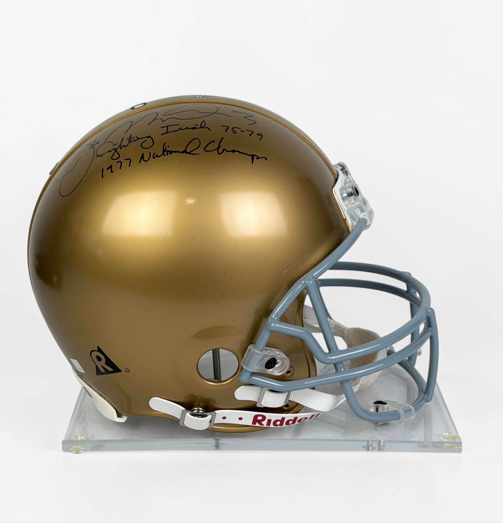 Signed Joe Montana Notre Dame Football Helmet: Signed on the top of the helmet with handwritten statistics. Certificate of authenticity included with photograph of the signature occuring. Dimensions of Helmet: 10" x 12 1/2&