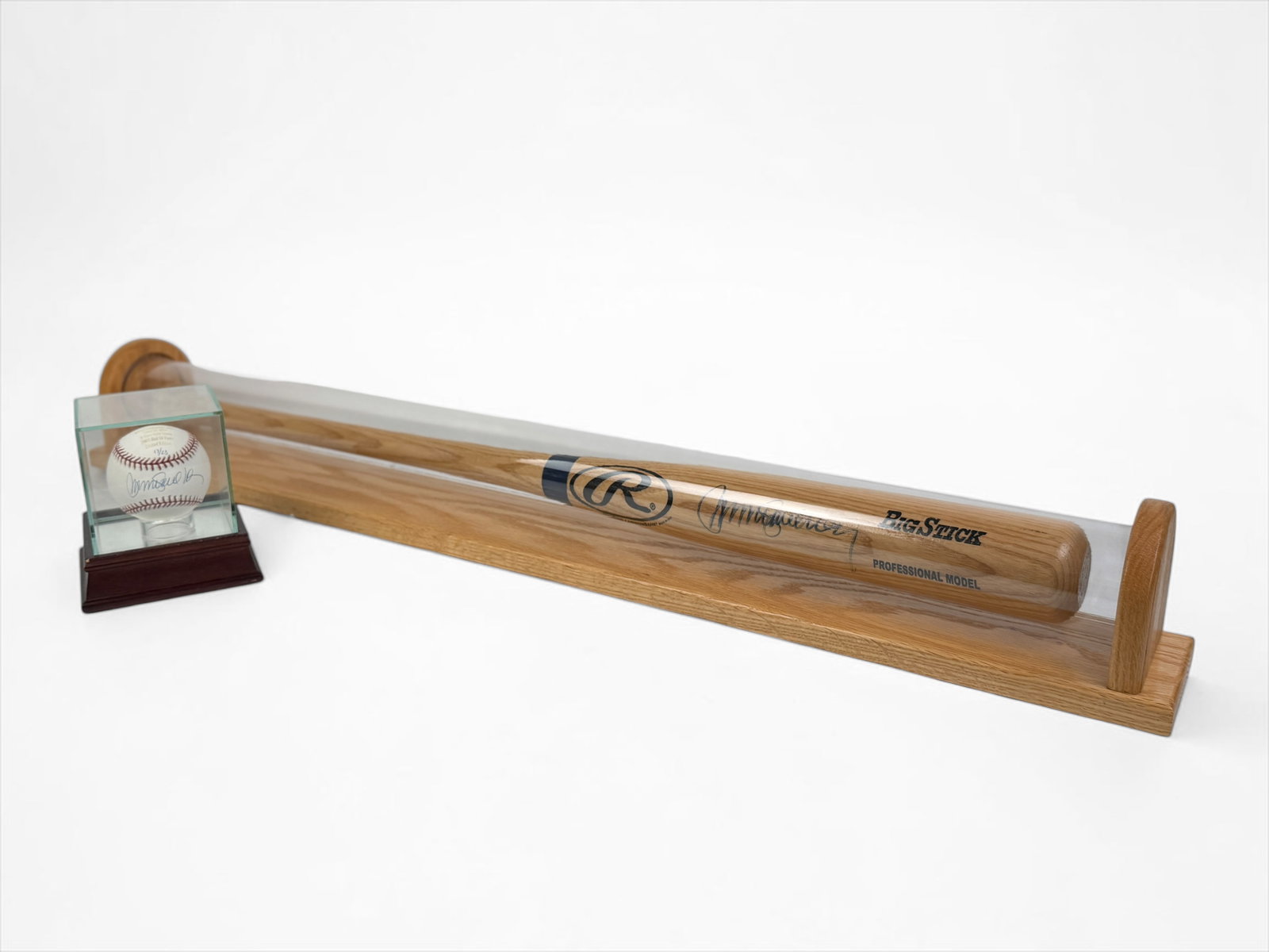 Signed Ryan Sandberg Baseball Bat and Ball: Both the bat and ball are in display cases. Limited Edition Ball: 17/23 Baseball Bat is not numbered. Length of Bat: 33 1/2" Condition: The items are in very good 