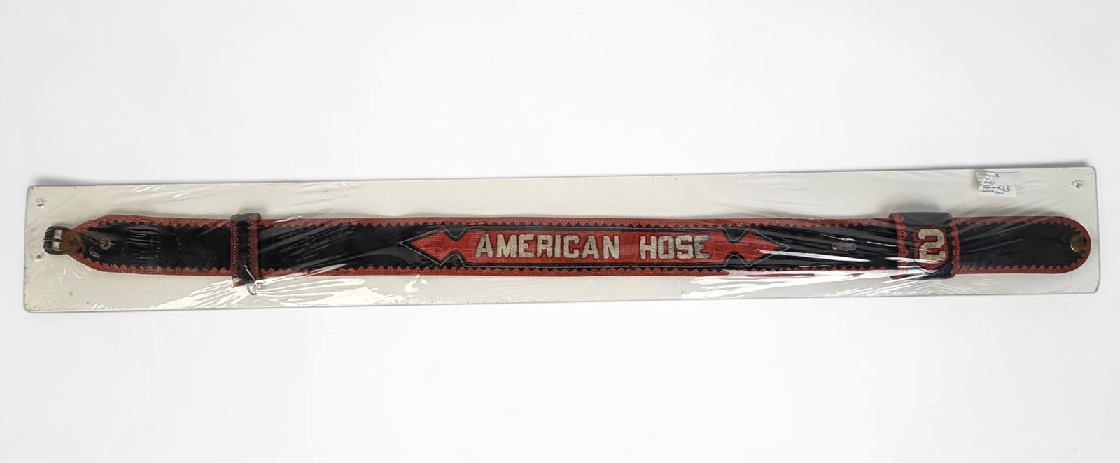 Antique American Hose Firemans Parade Belt: Dimensions: 42" long x 2 1/2" wide Condition: Wear and discoloration to the leather, but overall in good vintage condition. 