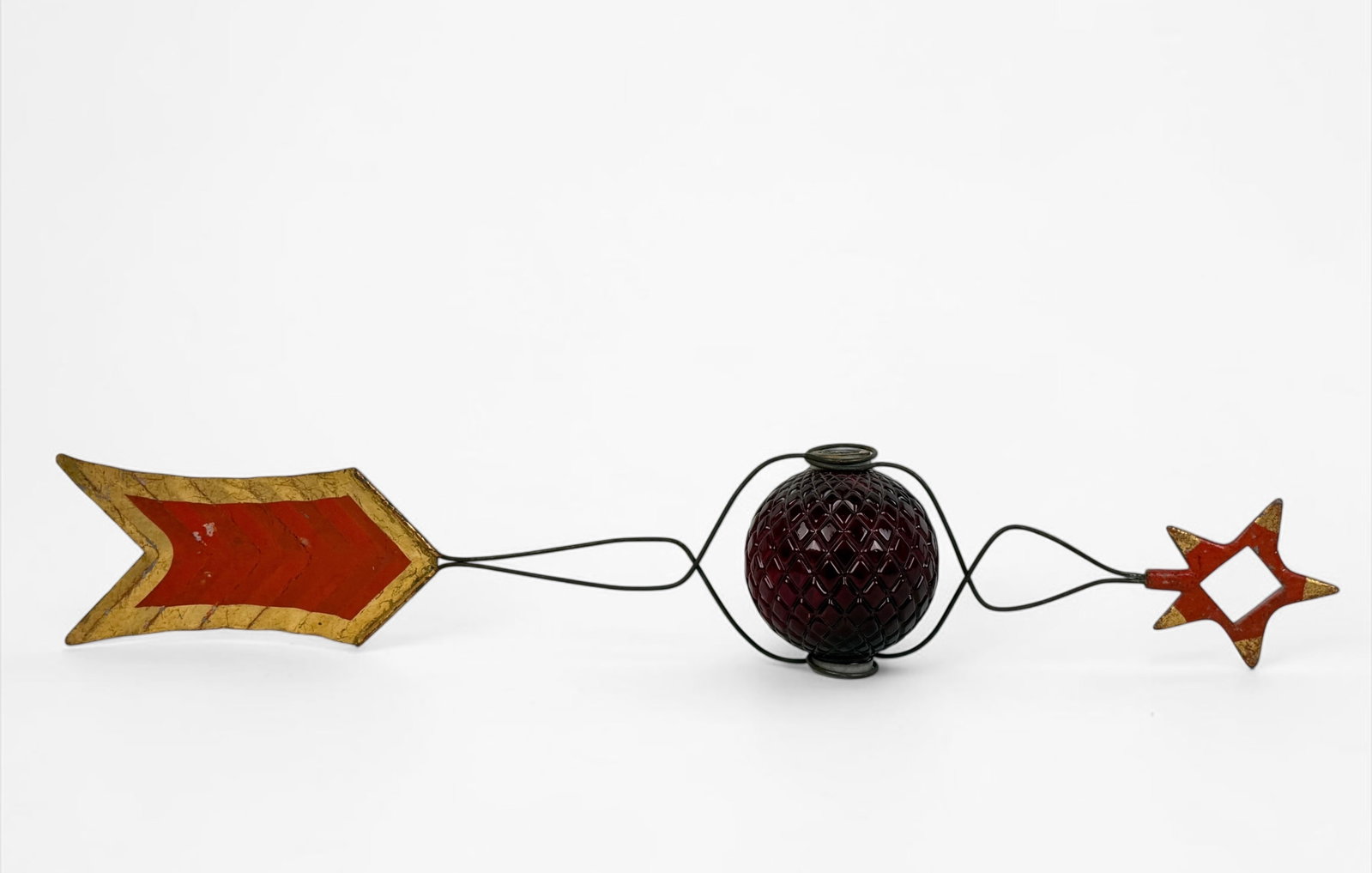 Antique Thompson Lighting Rod Co. Glass Orb Weathervane: Dimensions: 5 1/2" x 33" Condition: Minor loss of pigment throughout; minor warping to the tail of the weathervane. 