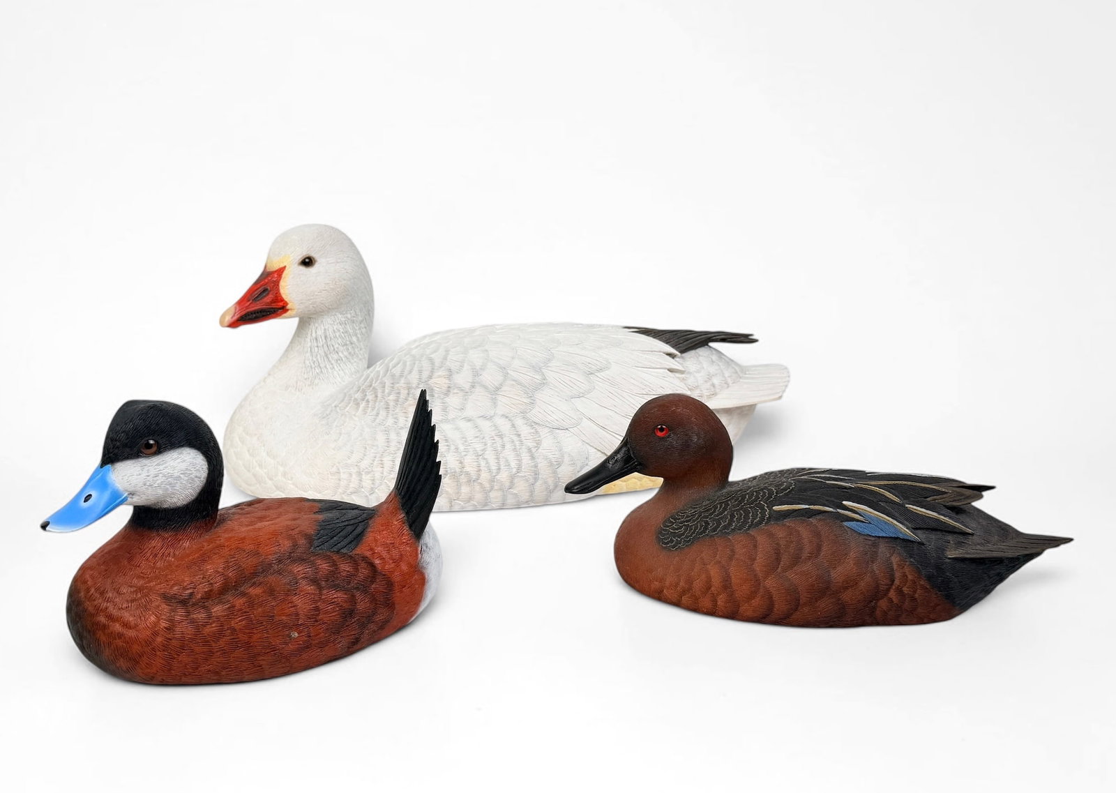 (3) Jules A. Bouillet Handcrafted Duck Decoys: Lot includes: (1) Cinnamon Teal Drake Duck Decoy Signed and numebred on the bottom Limited Edition: 607/2500 (1) Drake Ruddy Duck Signed and numbered on the bottom Limited Edition: 310/2500 (1)