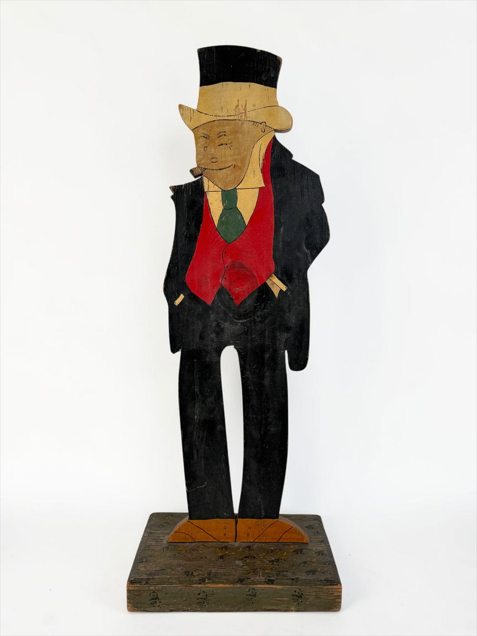 Folk Art Butler Ashtray (As Is): Dimensions: 27" x 10 1/4" x 9" Condition: The ashtray from the top of his hat is missing. Areas with loss of paint. Overall toning to the pigment. 