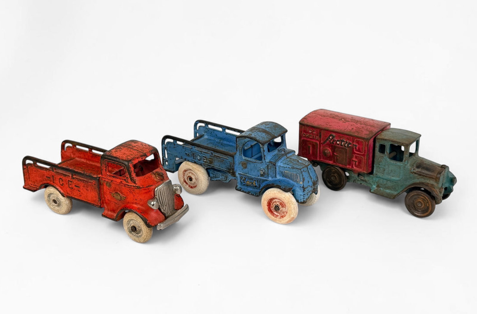 (3) Antique Cast Iron Toy Cars: Lot includes cars from Arcade and Kilgore. Dimensions of Largest: 3 1/2" x 6 1/2" x 2 1/2" Condition: Rust throughout all of the cars, consistent with the agin