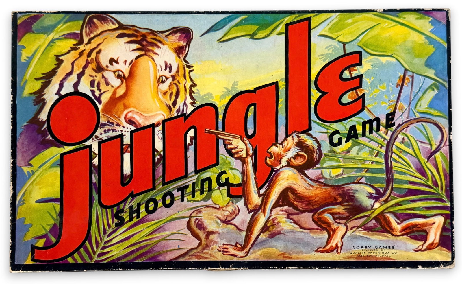 1942 Jungle Shooting Game: Produced by Corey Games. Dimensions: 17" Wide x 10" Deep x 1" Tall Condition: The game is complete with repairs to the gun piece. There is wear and age through