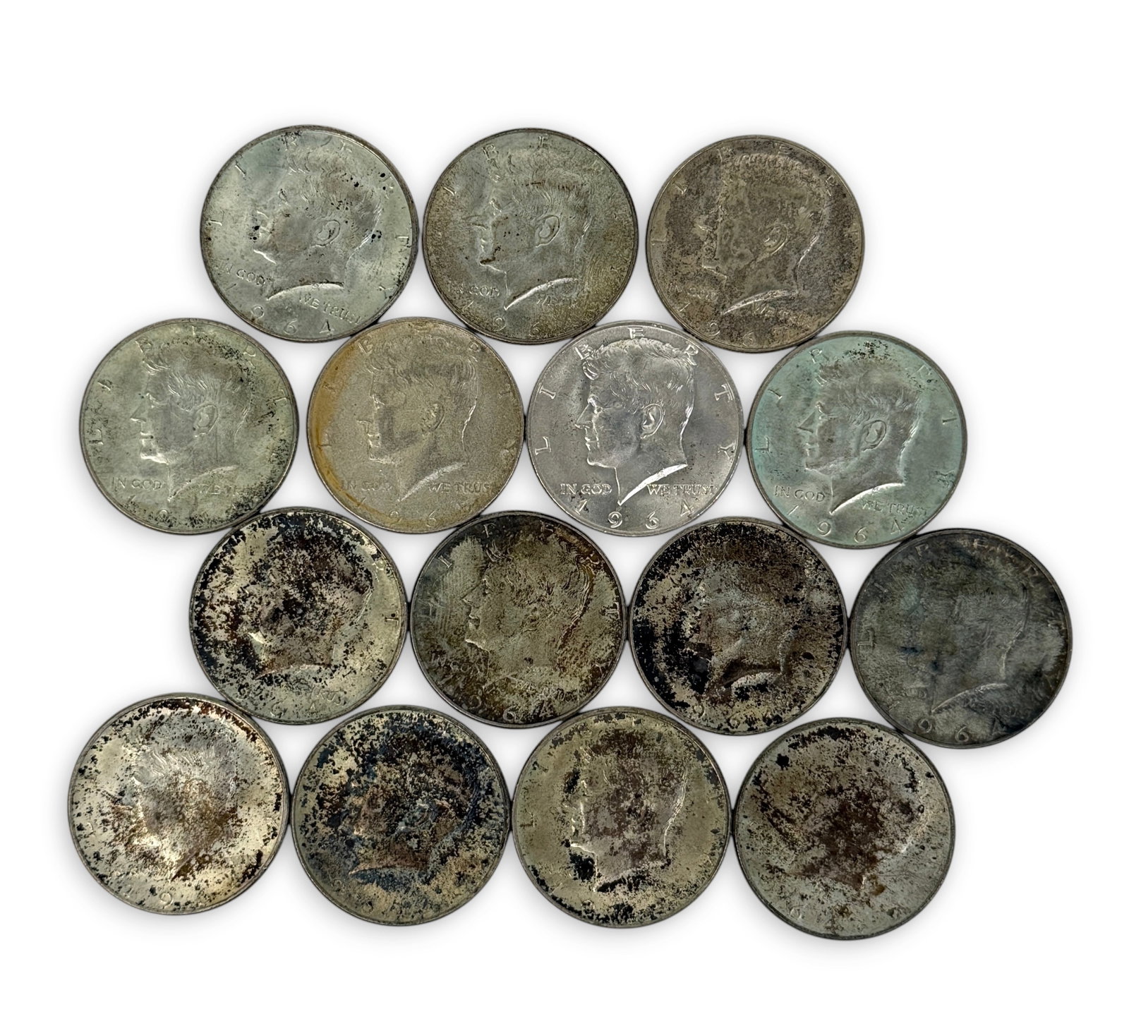 (15) Silver Half Dollars: Lot Includes the Following Dates: (13) 1964 (1) 1965 (1) 1967 Condition: Tarnished throughout the set. See images for details. 