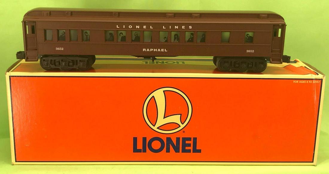 Lionel O gauge 19077 2652 Raphael passenger car in: Modern era Lionel O gauge 19077, 2652 Lionel Lines Raphael passenger car in original box, illuminated interior and magnetic couplers, light run time on wheels and rollers, C8-9. Box shows little wear 