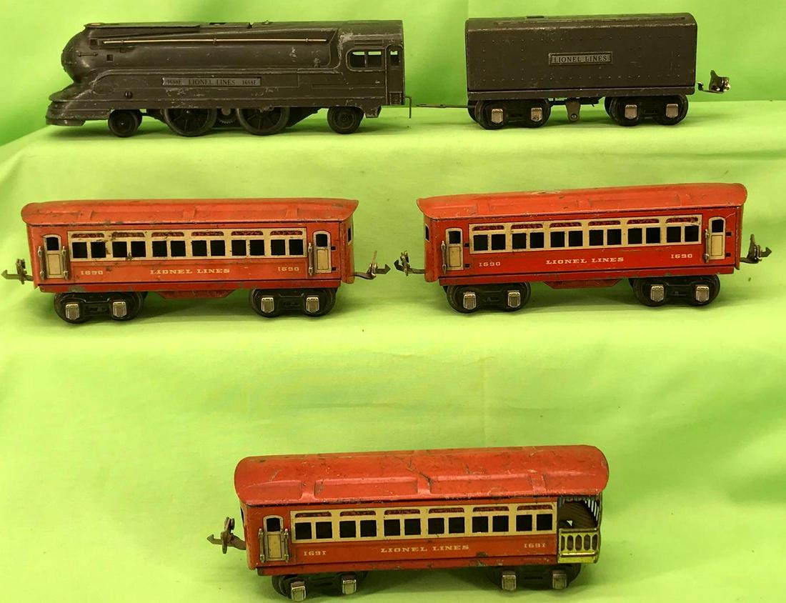 Lionel O gauge 1688E 1689W 1690 1690 1691: Postwar Lionel O gauge 1688E 2-4-2 streamline with 1689W whistle tender with two 1690 coaches, and 1691 observation. Cars have some missing handrails, loco has slightly bent roof and a missing red lam