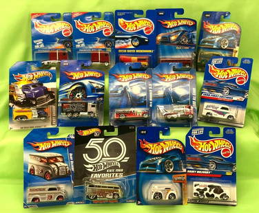 Hot Wheels mixed lot of 14 Oscar Mayer Weenermobile: Hot Wheels cars mint on original cards. Some cards have a price sticker on front. 1997 Dairy Delivery Got Milk, #18675; 2003 Blings Dairy Delivery, #B3566; 1998 Dairy Delivery Got Milk, #23814; 2009 D