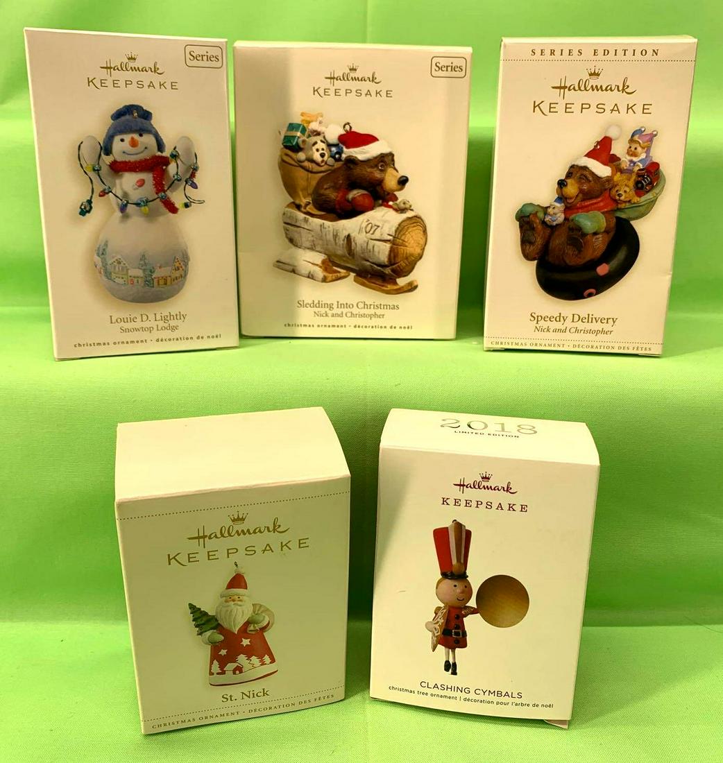 Hallmark Keepsake Ornaments Group of 5 Sledding in the: Hallmark Keepsake Ornaments Group of 5. All ornaments appear to be like new if not new. Boxes show little to no wear. This group includes, Sledding Into The Snow 2007, St. Nick 2006, Clashing Cymbals 