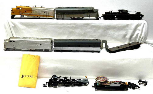 HO gauge diesel loco A and B shells chassis more: HO gauge diesel loco A and B shells, custom decorated. Diesel A unit powered chassis. Loco weight. Steam loco chassis and parts. All items in this lot are sold as they are shown in our photos with NO