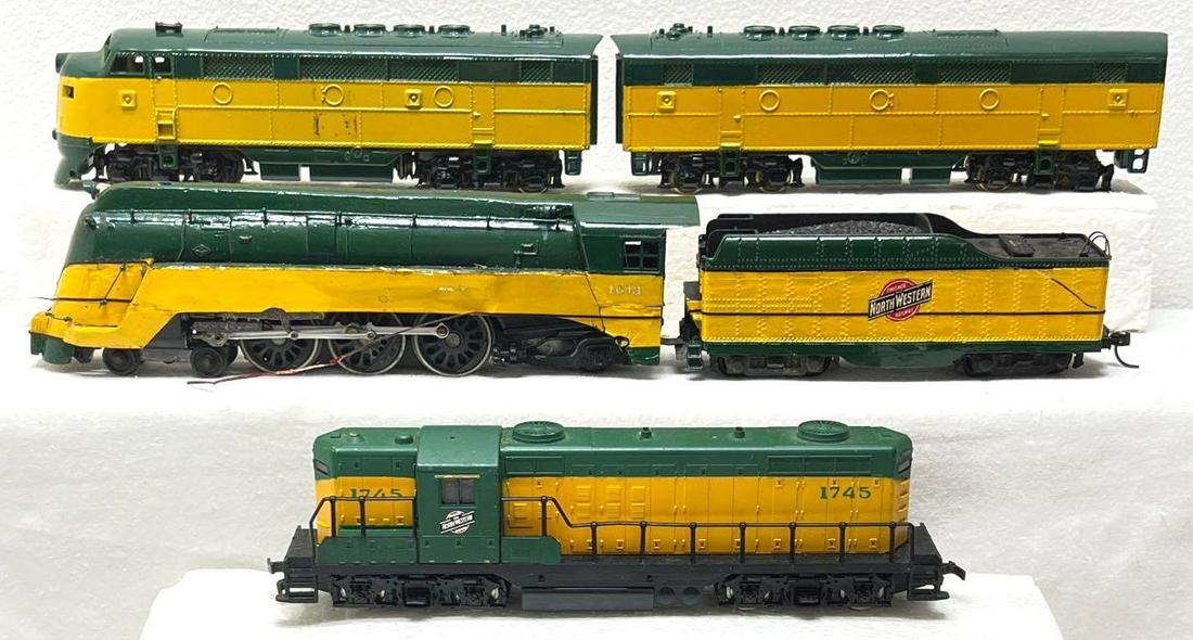 AHM Varney HO gauge C&NW diesel and steam locomotives: AHM Varney HO gauge C&NW Chicago and North Western diesel and steam locomotives. Trains have missing trim, couplers, etc. Please view photos carefully as the trains in this lot are sold as they ar