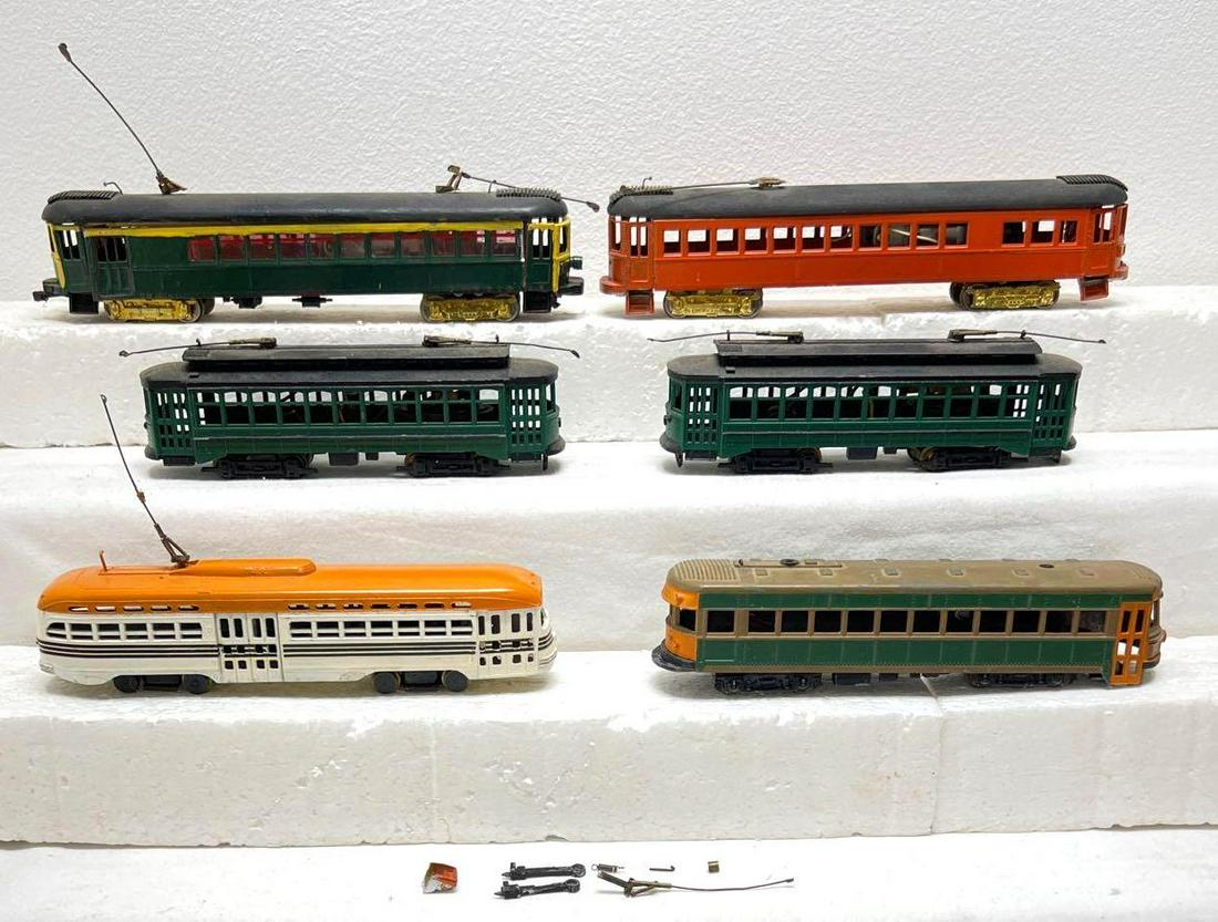 HO gauge trolley or interurban units six total kit: HO gauge trolley or interurban units six total kit built assembled. Trains may or may not be missing pieces, parts, trim, etc. All units are unmarked. All have a powered truck. Please view our photos 