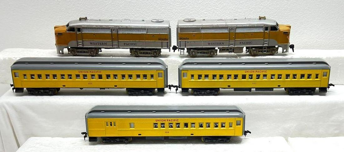 HO gauge Hobby Line Western Pacific AA units three Penn: HO gauge Hobby Line Western Pacific AA units three Penn Line Union Pacific passenger cars. Powered unit has a cracked shell at nose, and missing steps. Please view our photos very carefully as these t