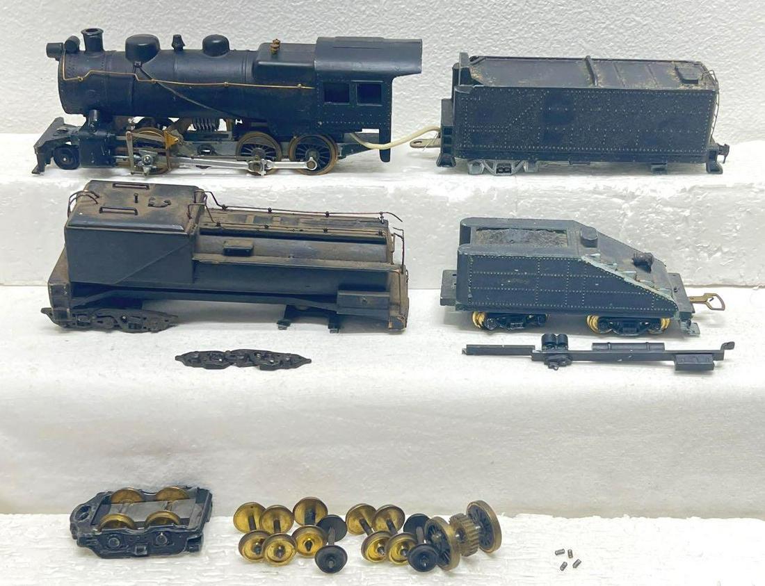 HO gauge Penn Line? 2-8-? loco and tender Varney slope: HO gauge Penn Line? 2-8-? Steam locomotive and tender, Varney slope back tender, unmarked oil tank set. Broken and missing trim and parts, etc. Please view our photos very carefully as these trains ar