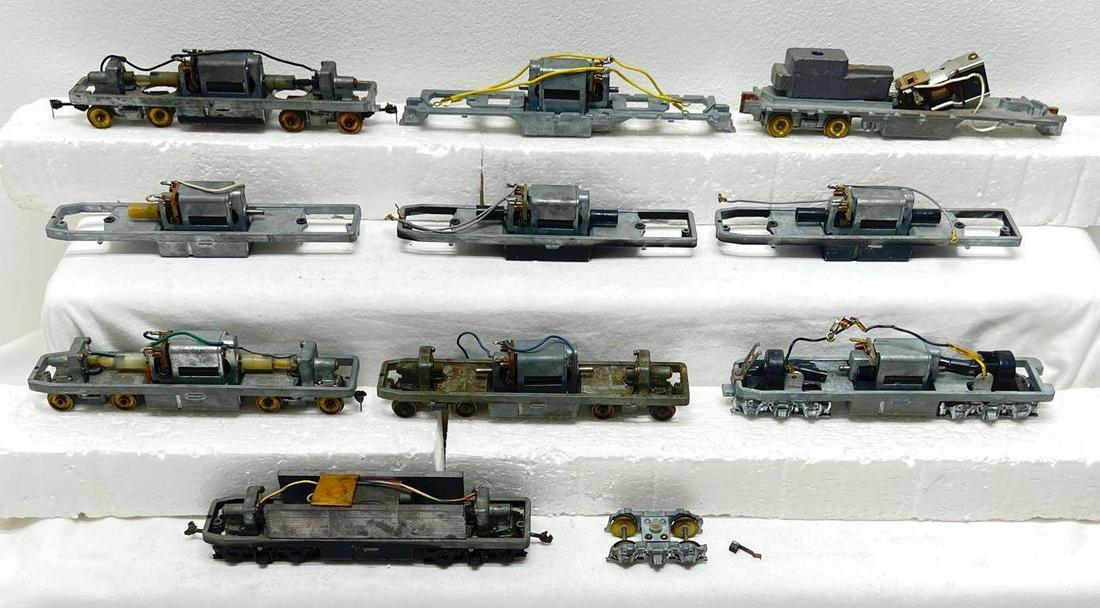 HO gauge diesel locomotive frames with motors truck: HO gauge diesel locomotive frames with motors, some with truck assemblies, some are used and some look NOS new old stock, unused. Nice lot for the scale model kit builder, operator, or a repair shop. 