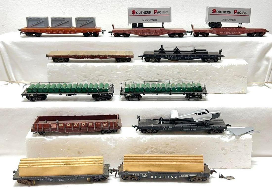 Eleven HO gauge/scale kit built flat cars with loads (1 of 4)