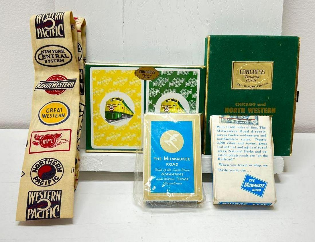 Chicago North Western The Milwaukee Road Playing Cards: Chicago North Western The Milwaukee Road Playing Cards And Tie. Two decks of Chicago and North Western Railway Company Congress Playing Cards one is still sealed one is open but appears to be like new