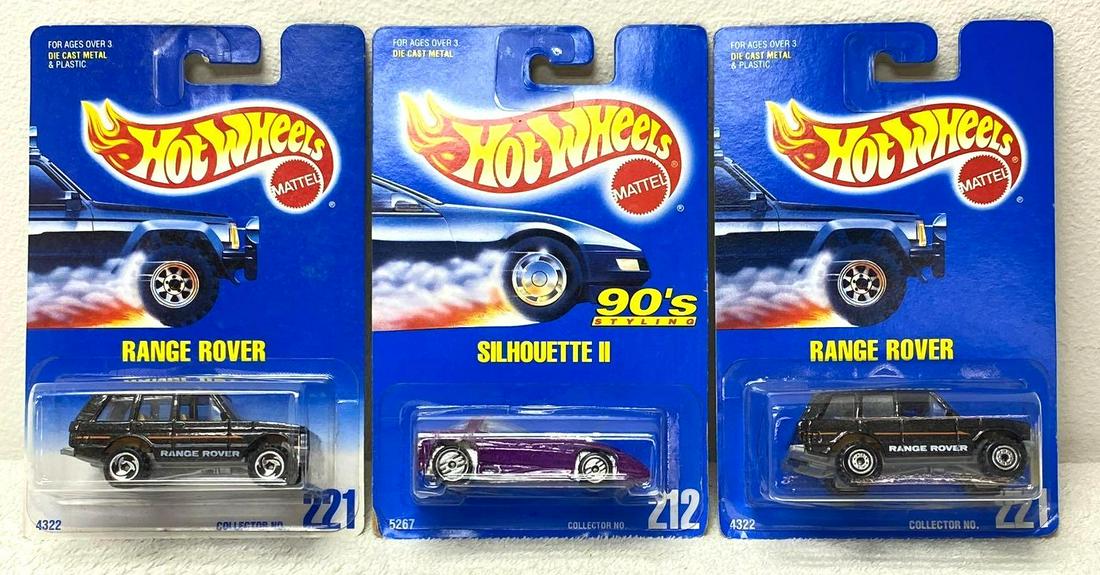 90's Hot Wheels Lot of (11) 1992 Blue Card Collectors: 90's Hot Wheels Lot of (11) 1992 Blue Card Collectors with variations including Collector #212 Silhouette II (car appears Mint In Near Mint Packaging, minor bottom corner damage, blister appears t