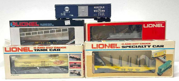 Modern Era Lionel O gauge 16301 9148 9302 9215 16375 in original boxes: Modern Era Lionel O gauge 16301 barrel ramp car, 9148 Duppont 3 dome tank car, 9302 L&amp;N Louisville and Nashville searchlight car, 9215 NW Norfolk &amp; Western boxcar, 16375 New York Central flat