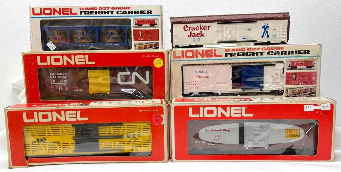 Modern Era Lionel O gauge 9725 9444 9718 9146 9757 9853 in original boxes: Modern Era Lionel O gauge 9725 MKT cattle car, 9444 Louisiana Midland box car, 9718 Canadian National boxcar, 9146 Moden David wine car, 9757 Central of Georgia box car, 9853 Cracker Jack billboard re