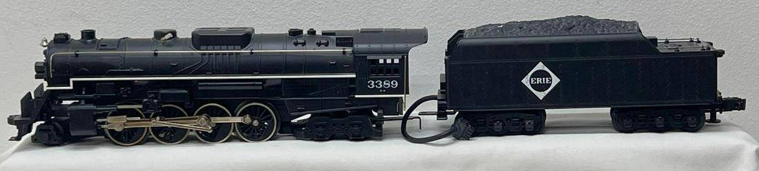 Modern Era MTH RailKing O gauge RK-1110 Erie Berkshire 2-8-4 whistle and smoke in original box: Modern Era MTH RailKing O gauge RK-1110 Erie Berkshire 2-8-4 steam locomotive with whistle and smoke in original box, should clean C8. Box shows light wear, clear tape, square and solid.