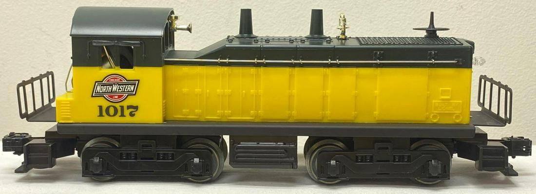 Modern Era Lionel O gauge 18921 Chicago and North Western NW-2 diesel switcher in original box: Modern Era Lionel O gauge 18921 Chicago and North Western NW-2 diesel switcher in original box, looks perfect but C8 really light run time. Box shows little wear, square and solid.