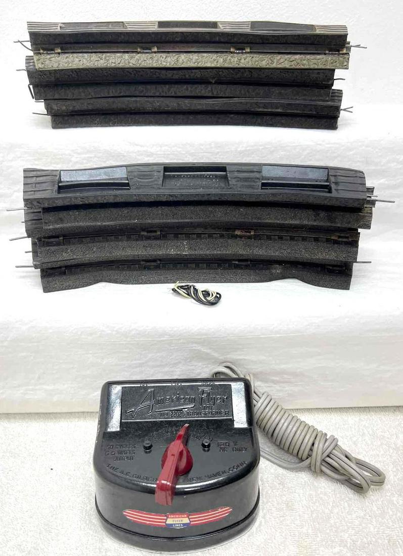Postwar American Flyer S Gauge 22020 track roadbed: Postwar American Flyer S Gauge 22020 50 watts transformer with original cord, twelve curved sections of track with rubber roadbed. Please view the items in this lot carefully as they are being sold as