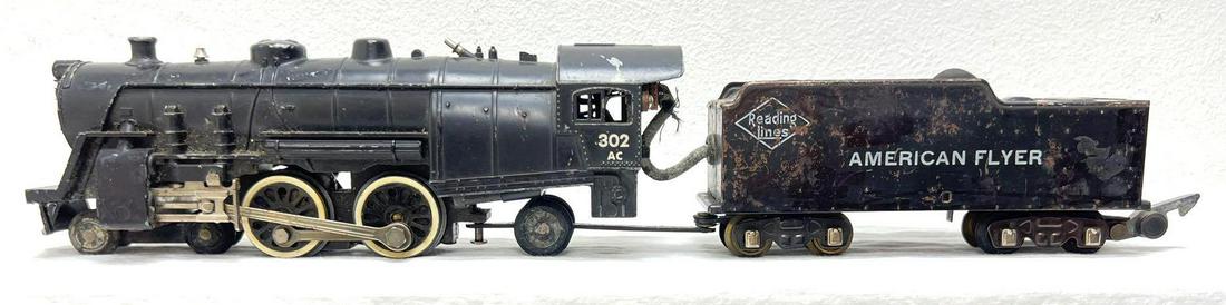 Postwar American Flyer S Gauge 302AC 4-4-2 Atlantic: Postwar American Flyer S Gauge 302AC Reading Lines 4-4-2 Atlantic steam locomotive with sheet metal tender. Loco and tender have marker touchups, mostly tender. Please view the items in this lot caref