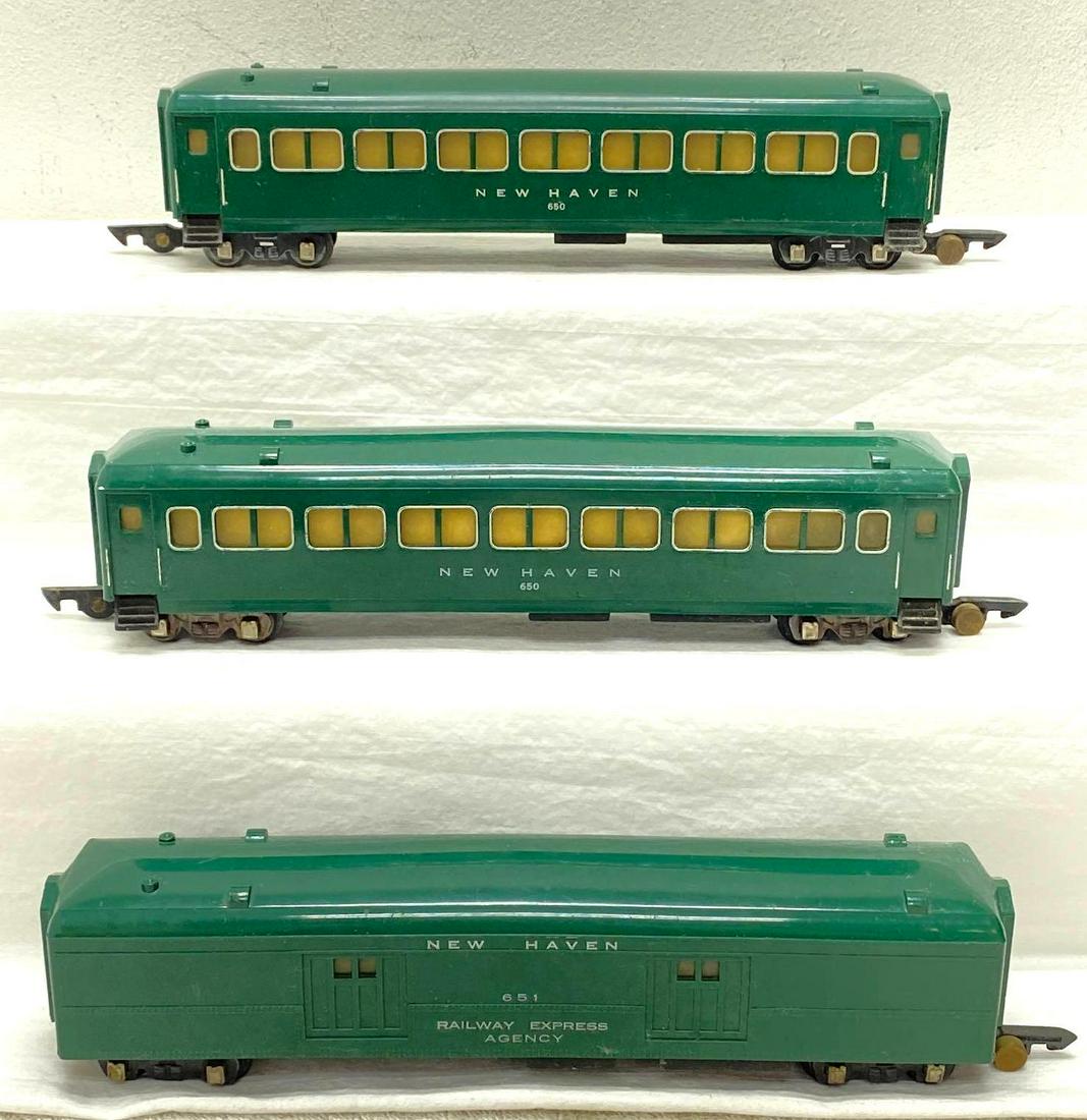 Postwar American Flyer S Gauge 650 650 651 New Haven passenger cars: Postwar American Flyer S Gauge 650 coach, 650 coach, 651 Railway Express Agency baggage, New Haven passenger cars, C6+. Please view the items in this lot carefully as they are being sold as shown