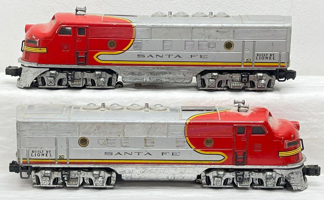 Postwar Lionel O Gauge 2343 Santa Fe F3 A units: Postwar Lionel O Gauge 2343P 2343T Santa Fe F3 twin diesel locomotive A units. Great all original trains, no touchups or repainting. Trains should clean and polish to look C6 or a tiny bit better. Ple