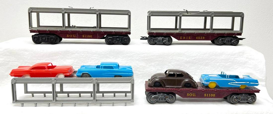 Postwar Marx O Gauge 51100 SOU 4528 ERIE 51100 SOU: Postwar Marx O Gauge 51100 SOU 4528 ERIE 51100 SOU, autocarrier flatcars, one train has four autos. 4528 silver superstructure has missing pieces. Please view the items in this lot carefully as they a