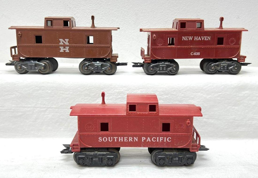 Postwar Marx O Gauge New Haven Southern Pacific New Haven C-635 cabooses: Postwar Marx O Gauge unnumbered brown New Haven caboose, unnumbered Southern Pacific, New Haven C-635 cabooses. Unnumbered New Haven has some glue repairs to railing, some rust on wheels. C-635 has gl