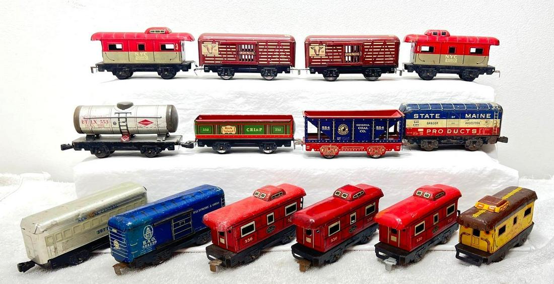 Postwar Marx O Gauge 59 59 552 553 554 555 three 5565 2071 4491 3824 two 20102: Postwar Marx O Gauge two 59 Union Pacific cattle/stock, 552 Rock Island gondola, 553 Union Tank Car, 554 Northern Pacific General Coal hopper, 555 Baltimore and Ohio boxcar, three 556 New York Central