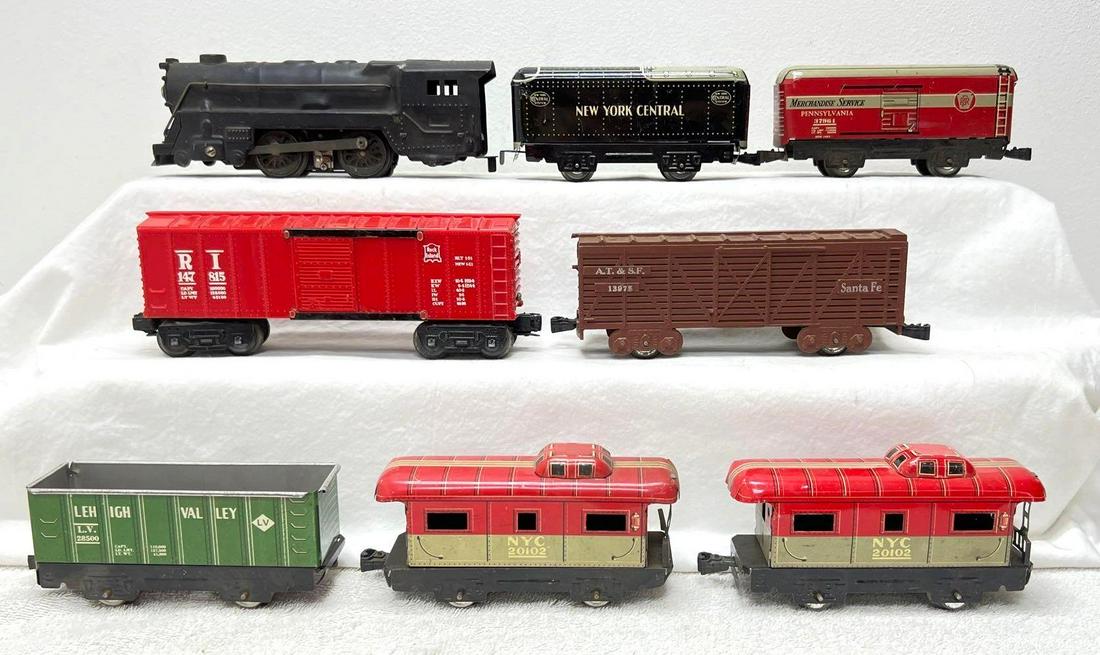 Postwar Marx O Gauge 0-4-0 551 28500 37961 147815 13975 20102 20102: Postwar Marx O Gauge 0-4-0 sheet metal steam locomotive, 551 New York Central lithographed tinplate tender, 28500 Lehigh Valley tall side gondola, 37961 Pennsylvania boxcar, 147815 Rock Island box car