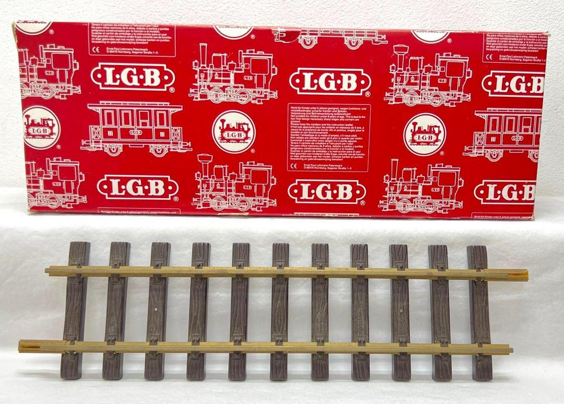 Modern Era LGB G Scale 1000 0 300mm straight in original box: Modern Era LGB G Scale 1000 0 300mm straight in original box, ten (10)sections. Track is used and has tarnish on some rails, some dirt/dust. Box shows poked holes in one end, light wear. Please view t
