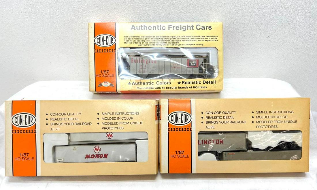 HO Gauge/Scale three Con-Cor freight cars in original boxes: HO Gauge/Scale three Con-Cor freight cars in original boxes, trains should clean C7-8. Boxes show very little to light wear. Two 0004-008100 40' piggyback box trailers, Monon, 0001-009517 Burlingt
