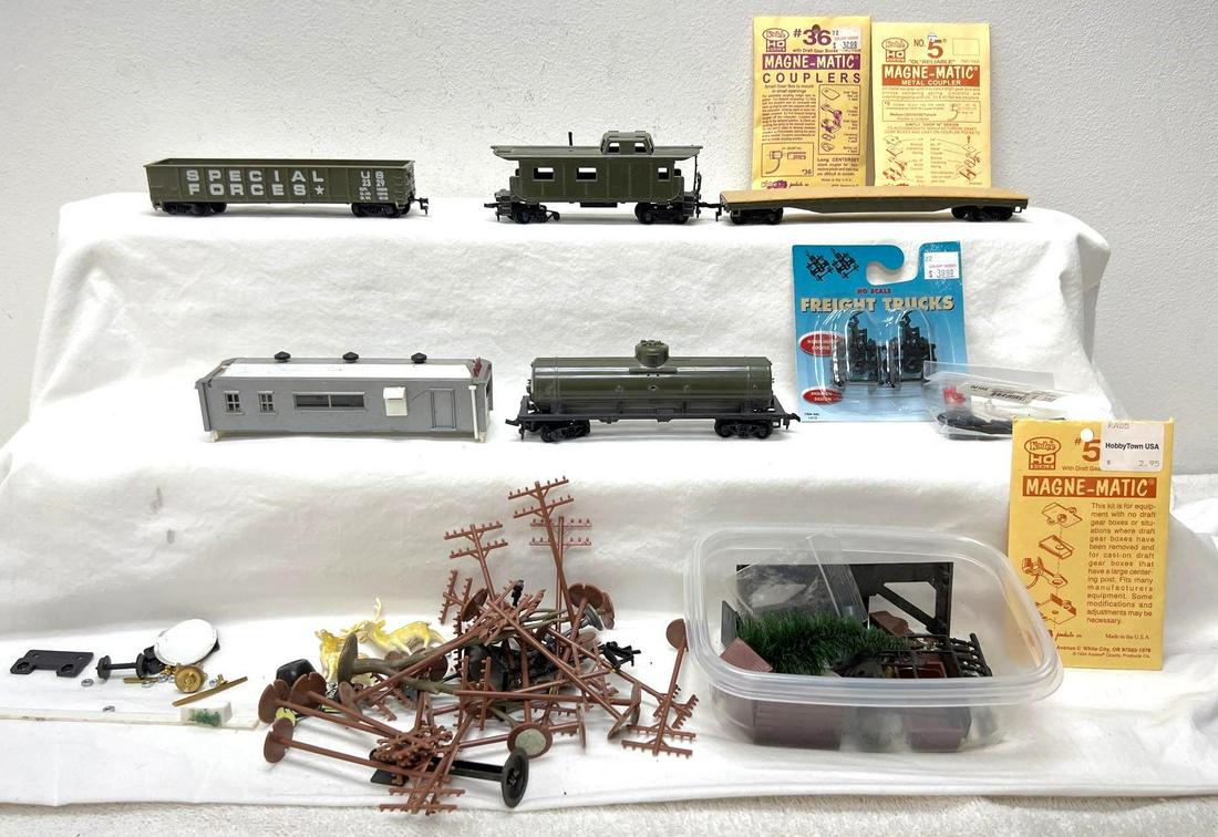 HO Gauge/Scale Tyco GI Joe Special Forces cars and more: HO Gauge/Scale Tyco GI Joe Special Forces freight cars, diner building, Kadee couplers in envelopes, Life-Like freight couplers on blister card, layout accessories, more. Please view the photos of the
