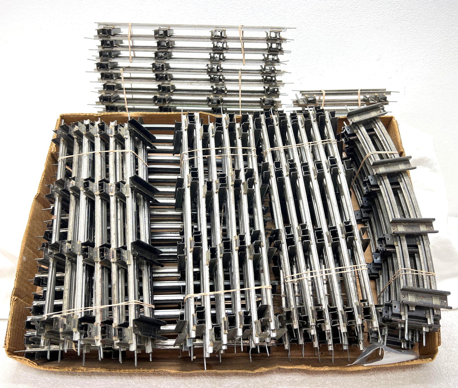 Postwar American Flyer S Gauge 72 curved 43 straight 3 1/2 straight: Postwar American Flyer S Gauge 72 curved, 43 straight ,3 1/2 straight, 3 1/2 curved. Some track is rusty, some is painted, some is very clean and ready to use. Please view the photos of the items in t