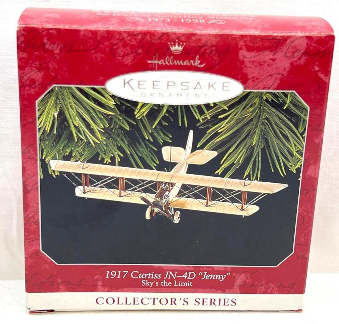 Hallmark Keepsake Ornament Collectors Series Skys The Limit: Hallmark Keepsake Ornament Collectors Series Skys The Limit. This lot includes, 1998 1917 Curtiss JN-4D "Jenny", second in the series. Ornament appears new, never displayed Mint condition. Box