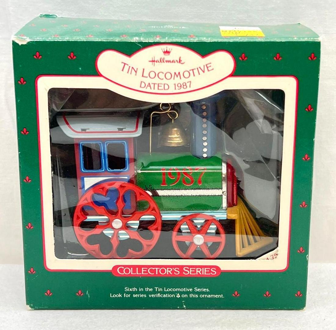 Hallmark Keepsake Ornament Tin Locomotive: Hallmark Keepsake Ornament Tin Locomotive. This lot includes, 1987 Tin Locomotive, sixth in the series. Ornament appears new, never displayed Mint condition. Box shows little to no wear. Ornaments are
