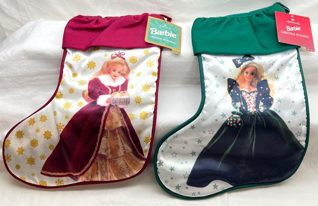 Hallmark Barbie Holiday Stockings Lot Of Two: Hallmark Barbie Holiday Stockings lot of two. This great group includes 1995 Barbie Christmas Stocking Green and 1996 Barbie Christmas Stocking Red. Both are new never used or hung. Mint Condition.