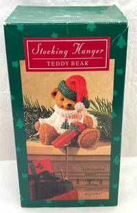 Hallmark Keepsake Ornaments Teddy Bear Stocking Hanger: Hallmark Keepsake Ornaments Teddy Bear Stocking Hanger. Teddy bear with a Christmas Sweater. Stocking Hanger Teddy Bear. Ornament is used but in excellent condition. Box is in great shape with little