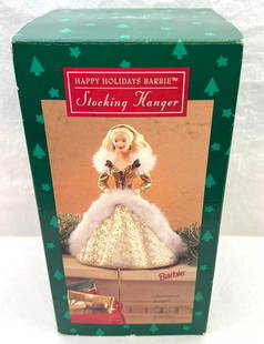 Hallmark Keepsake Ornaments Happy Holidays Barbie Stocking Hanger: Hallmark Keepsake Ornaments Happy Holidays Barbie Stocking Hanger. 1995 (gold dress), Happy Holidays Barbie stocking hanger. Ornament is used but in excellent condition. Box is in great shape with