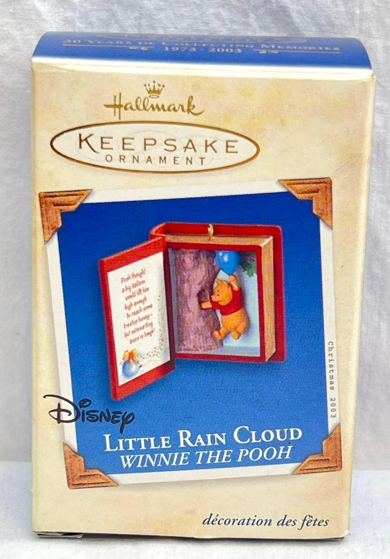 Hallmark Keepsake Ornaments Winnie The Pooh Little Rain Cloud sixth in the series: Hallmark Keepsake Ornaments Winnie The Pooh Little Rain Cloud sixth in the series. This lot includes, 2003 Winnie The Pooh Collector's Series Little Rain Cloud, sixth in the series. Ornament is in