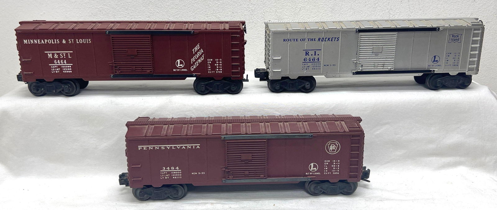 Postwar Lionel O Gauge 3484 PRR 6464-50 MStL 6464-75 RI box cars (1 of 7)